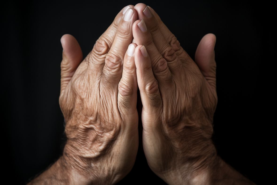 Hands held in prayer